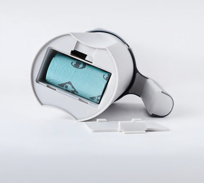 White plastic holder with a roll of blue paper on a white background